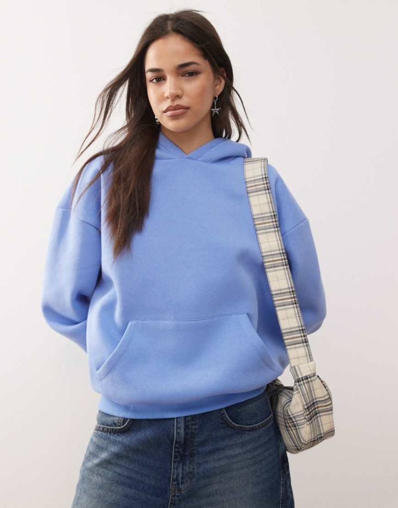COLLUSION - Schwerer Kapuzenpullover in Blau mit kastigem Schnitt von Collusion