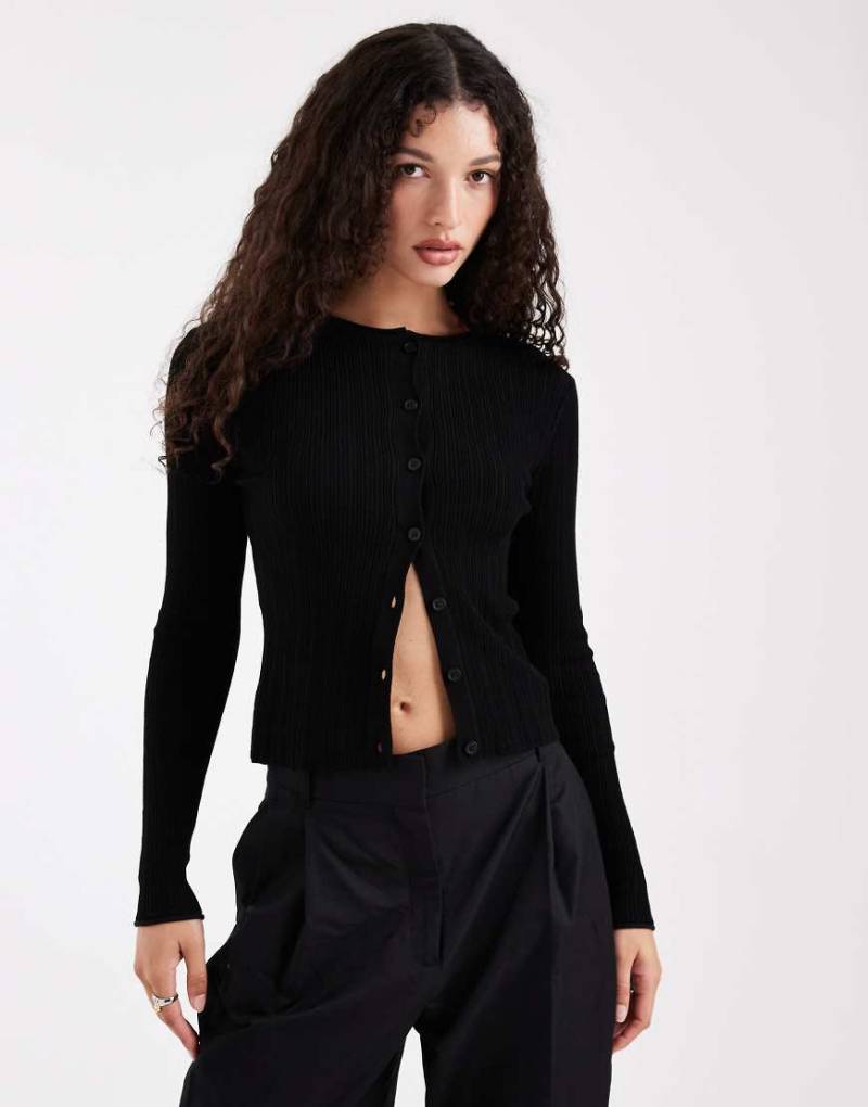 COLLUSION - Strickjacke aus Feinstrick in Schwarz-Keine Farbe COLLUSION - Strickjacke aus Feinstrick in Schwarz-Keine Farbe von Collusion