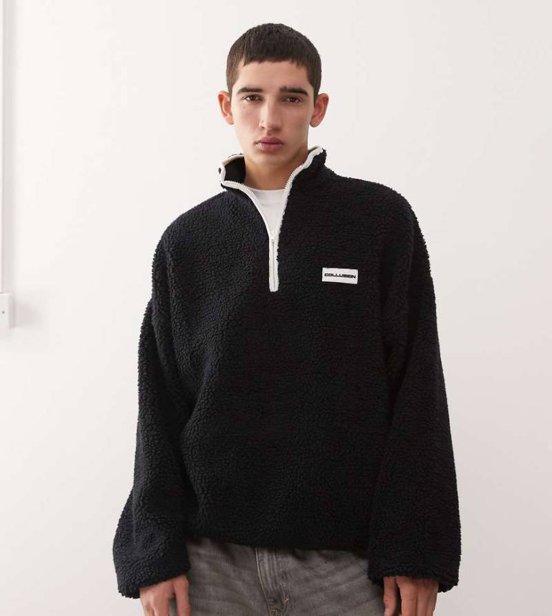 COLLUSION - Sweatshirt aus Teddyfleece in Schwarz mit halblangem Reißverschluss von Collusion