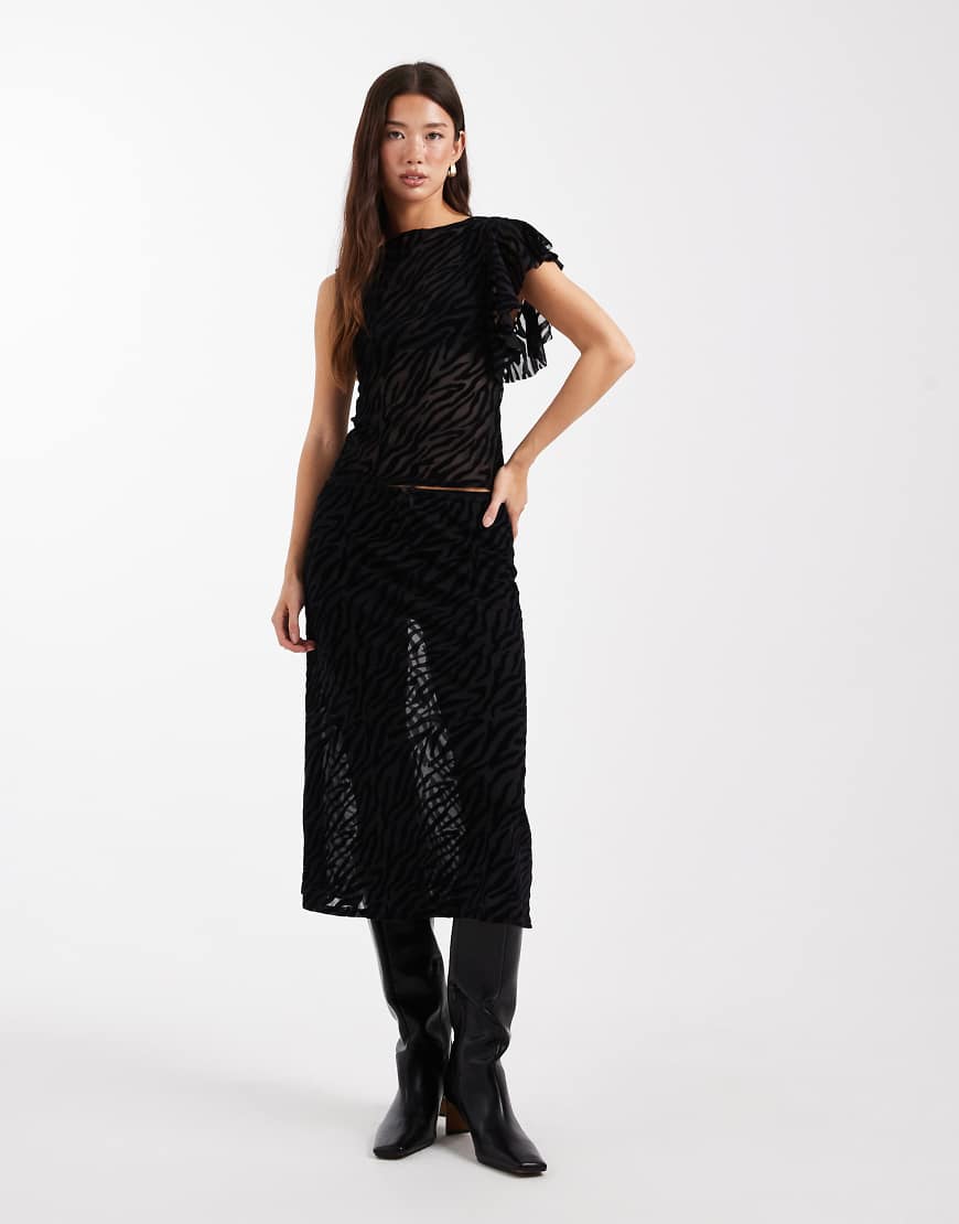 COLLUSION - Transparenter Rock in ungewöhnlicher Länge mit beflocktem Zebramuster, Kombiteil-Schwarz von Collusion