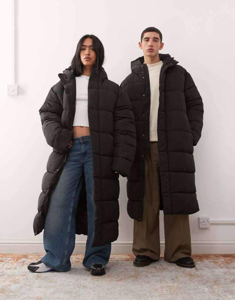 COLLUSION Unisex - Maxi-Puffermantel in Schwarz COLLUSION Unisex - Maxi-Puffermantel in Schwarz von Collusion
