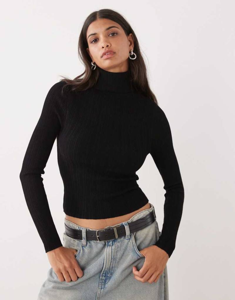 COLLUSION - Weicher Rollkragenpullover aus Rippstrick in Schwarz von Collusion