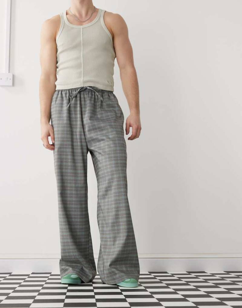 COLLUSION - Weite, elegante Jogginghose in Grau kariert mit elastischem Bund von Collusion