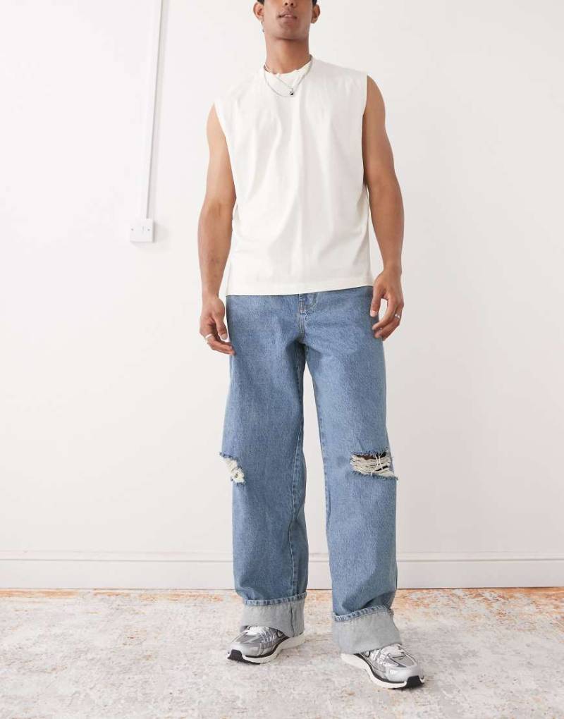 COLLUSION - Umgeschlagene Baggy-Jeans in mittlerer Waschung-Blau von Collusion