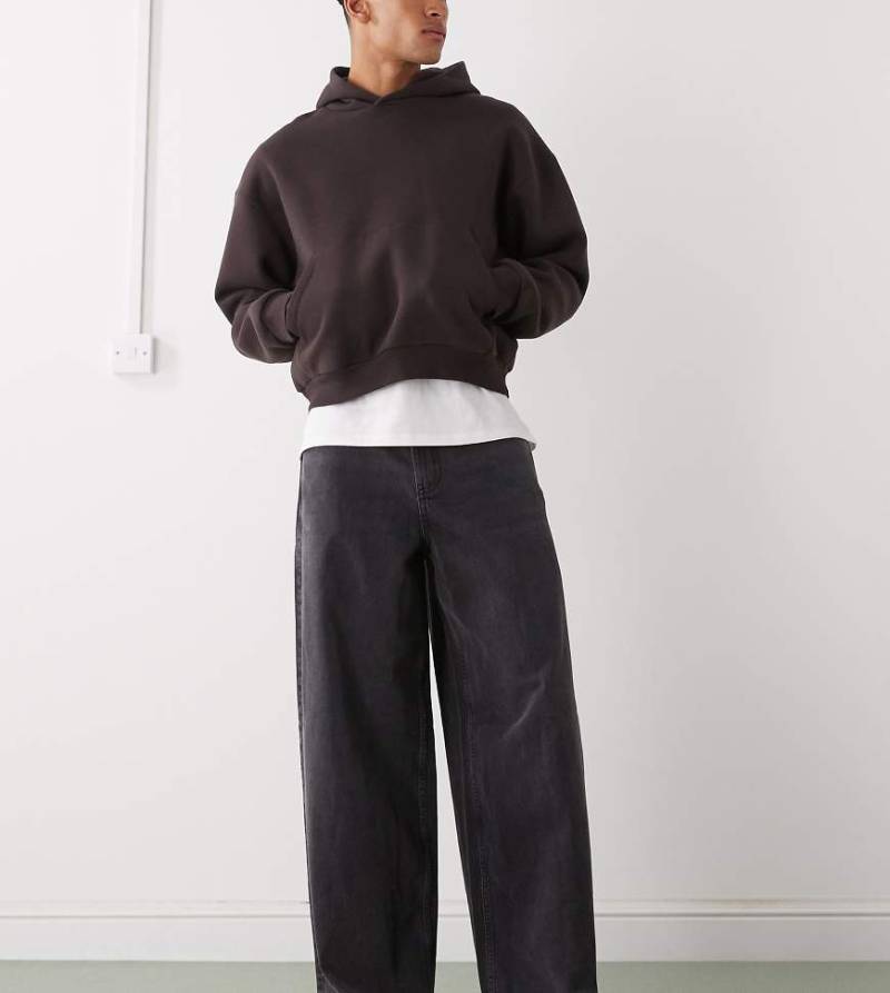 COLLUSION - X003 - Weit geschnittene Jeans in verwaschenem Schwarz mit mittelhohem Bund von Collusion