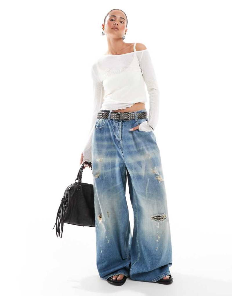 COLLUSION - XL - Weite Jeans in Used-Waschung mit niedrigem, verstellbarem Bund-Blau von Collusion