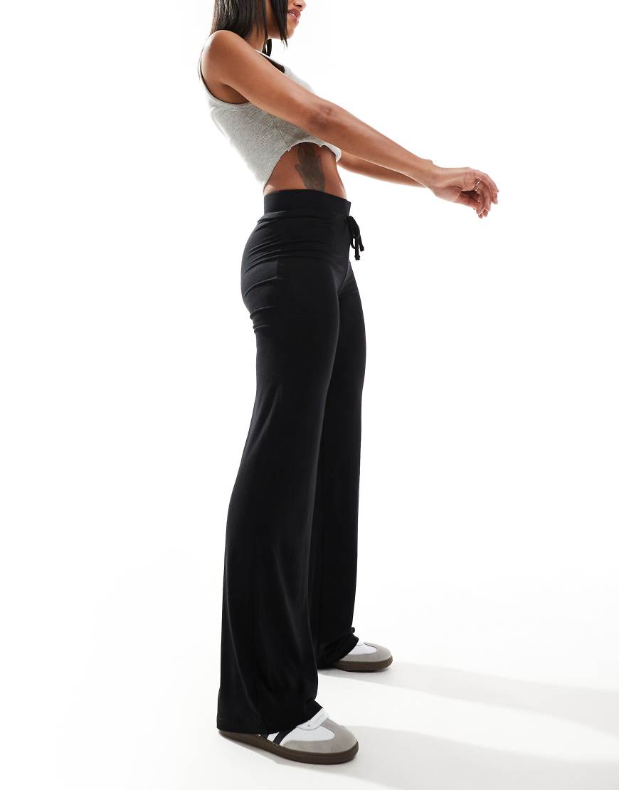 COLLUSION - Yoga-Hose in Schwarz von Collusion