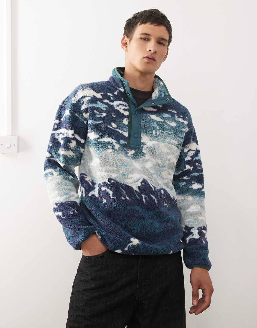 Columbia - Helvetia II - Gemustertes Fleece-Sweatshirt in Blau mit kurzer Druckknopfleiste von Columbia