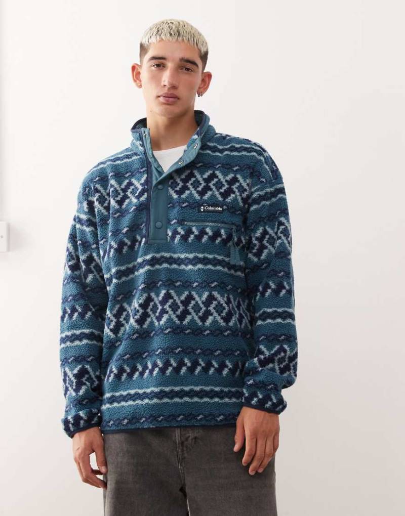 Columbia - Helvetia II - Gemustertes Fleece-Sweatshirt in Blau mit kurzer Druckknopfleiste Columbia - Helvetia II - Gemustertes Fleece-Sweatshirt in Blau mit kurzer Druckknopfleiste von Columbia