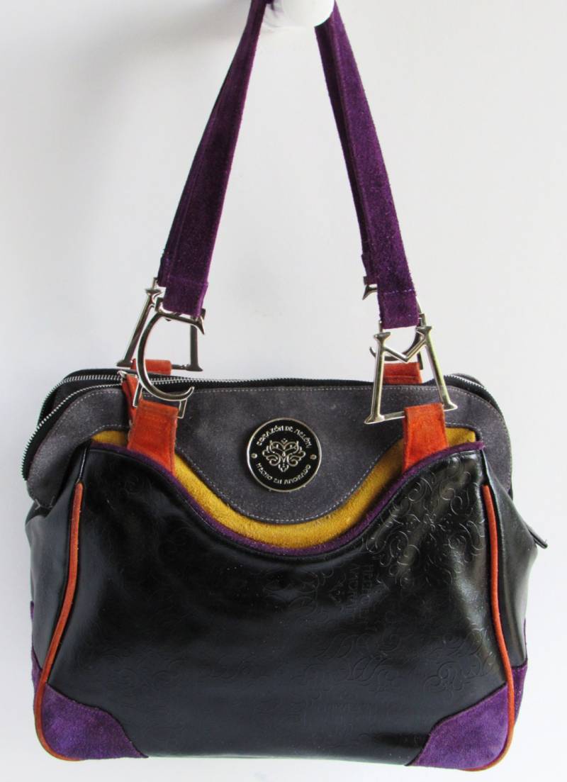 Corazon De Melon Umhängetasche Aus Schwarzem Geprägtem Leder Und Mehrfarbigem Wildlederbesatz von ConsignmentExchange