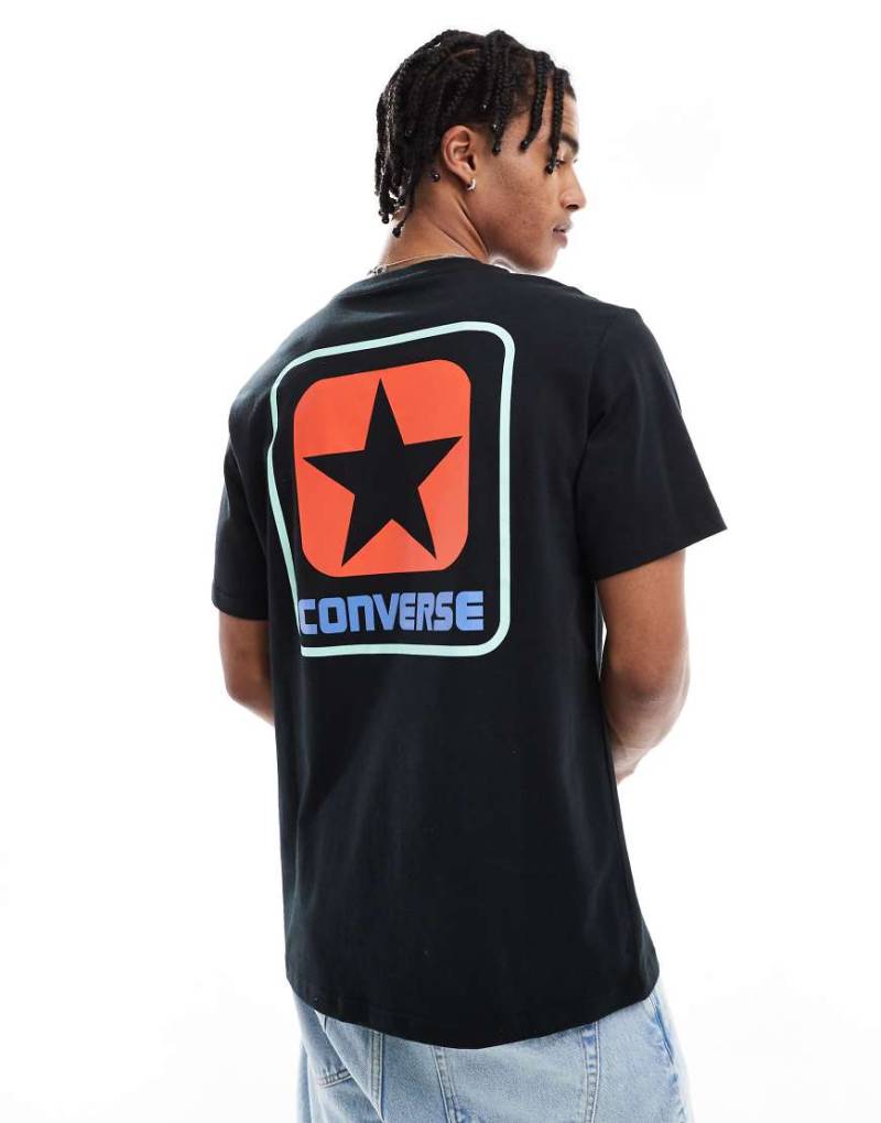 Converse - T-Shirt in Schwarz mit seitlichem Logo von Converse