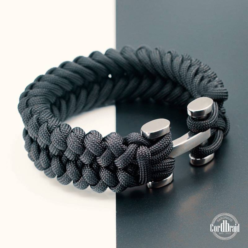 Cordbraid Paracord Armband Der Extraklasse - Edelstahlverschluss Custom Made, Titanium Split Rings, Tactical 9 Stand von Cordbraid