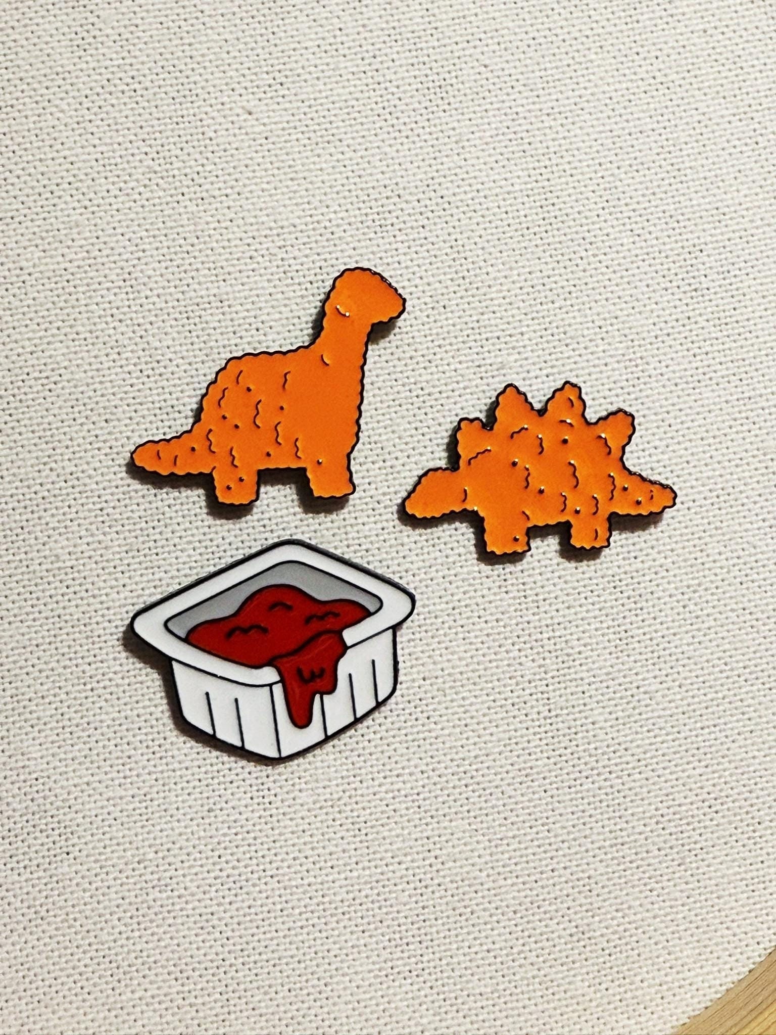 Dino Nuggets Metall Emaille Pin Set Anstecker Anstecknadel Tasche Rucksack Jacke Abzeichen Accessoires Dino Nuggets Metall Emaille Pin Set Anstecker Anstecknadel Tasche Rucksack Jacke Abzeichen Accessoires von CosyIslandLiving