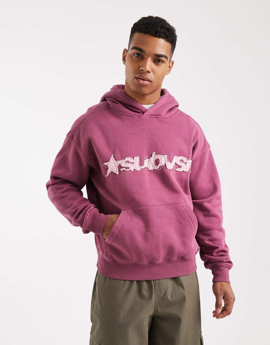 Cotton On - Kastiger Kapuzenpullover in Heiderose mit Grafik-Rosa von Cotton On