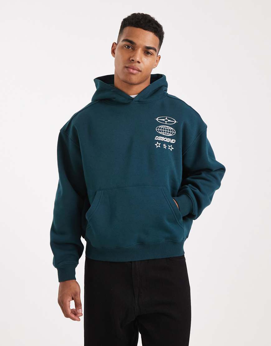 Cotton On - Cropped-Fit-Kapuzenpullover in Tiefseepetrol mit Grafik-Grün von Cotton On