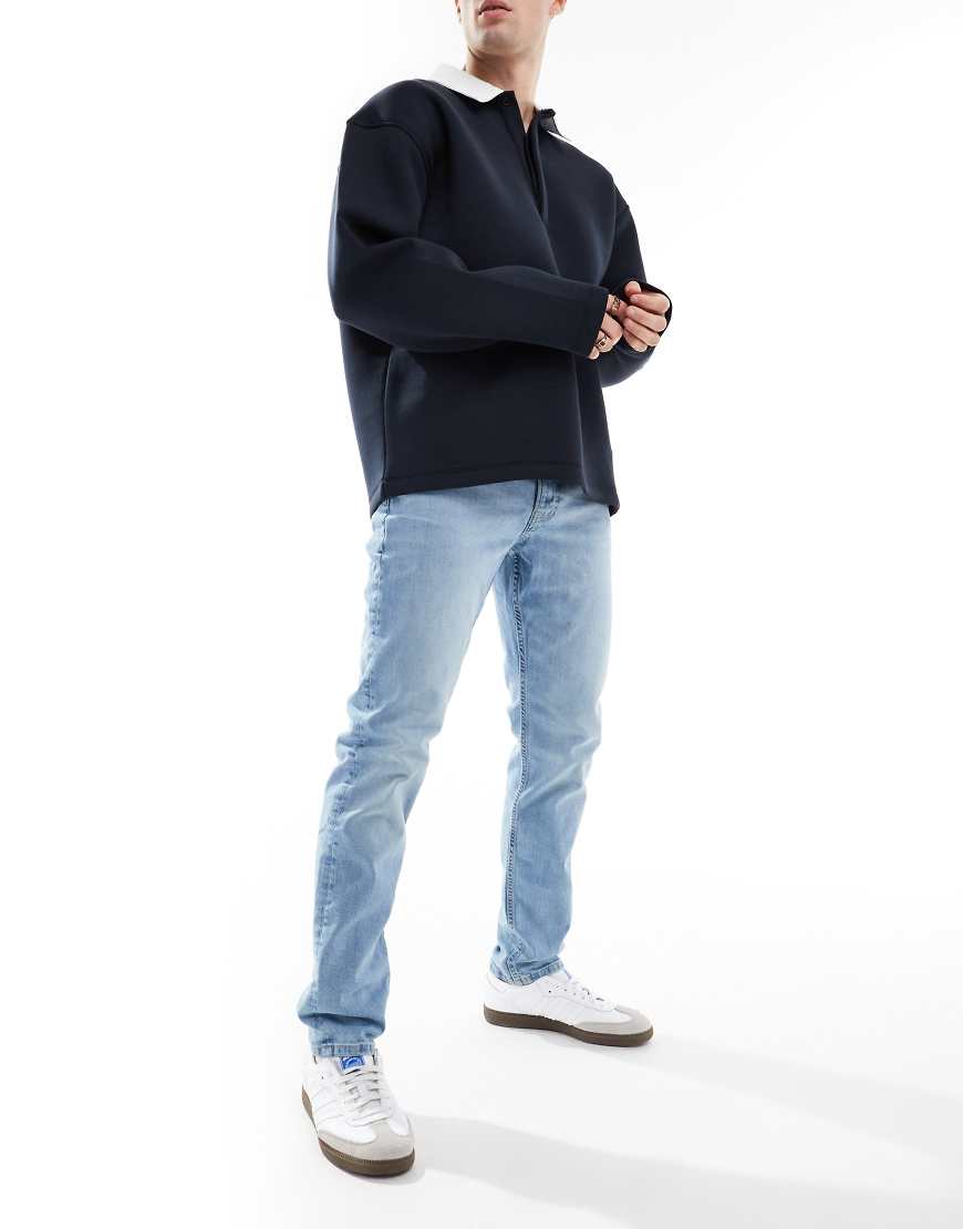 Cotton On - Jeans in regulärer, schmaler Passform aus Denim in American-Blau-Neutral von Cotton:On