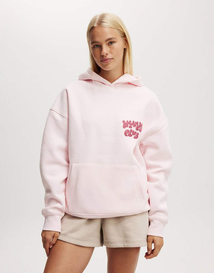 Cotton On - Premium - Plüschiger Kapuzenpullover in Rosa mit Grafikmotiv Cotton On - Premium - Plüschiger Kapuzenpullover in Rosa mit Grafikmotiv von Cotton:On