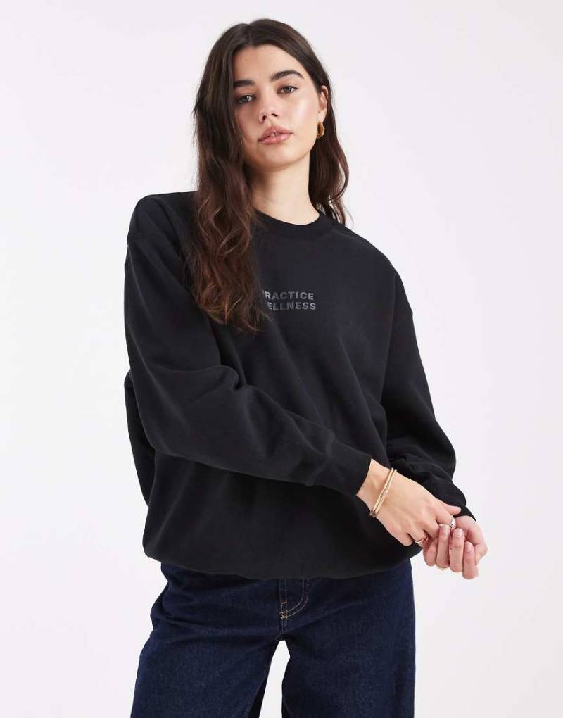 Cotton On - Weiches Sweatshirt in Schwarz mit Rundhalsausschnitt und Print von Cotton On