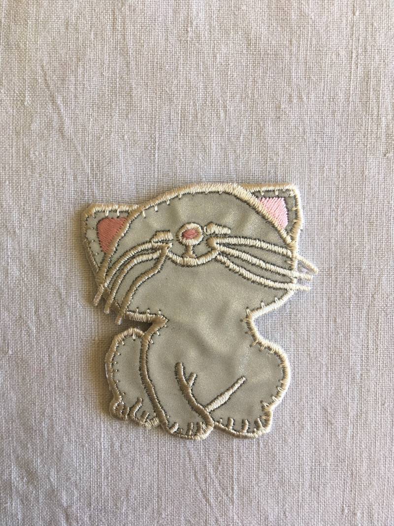 Fluoreszierendes Katzen-Bügelmotiv Fluoreszierendes Katzen-Bügelmotiv von Coudfil