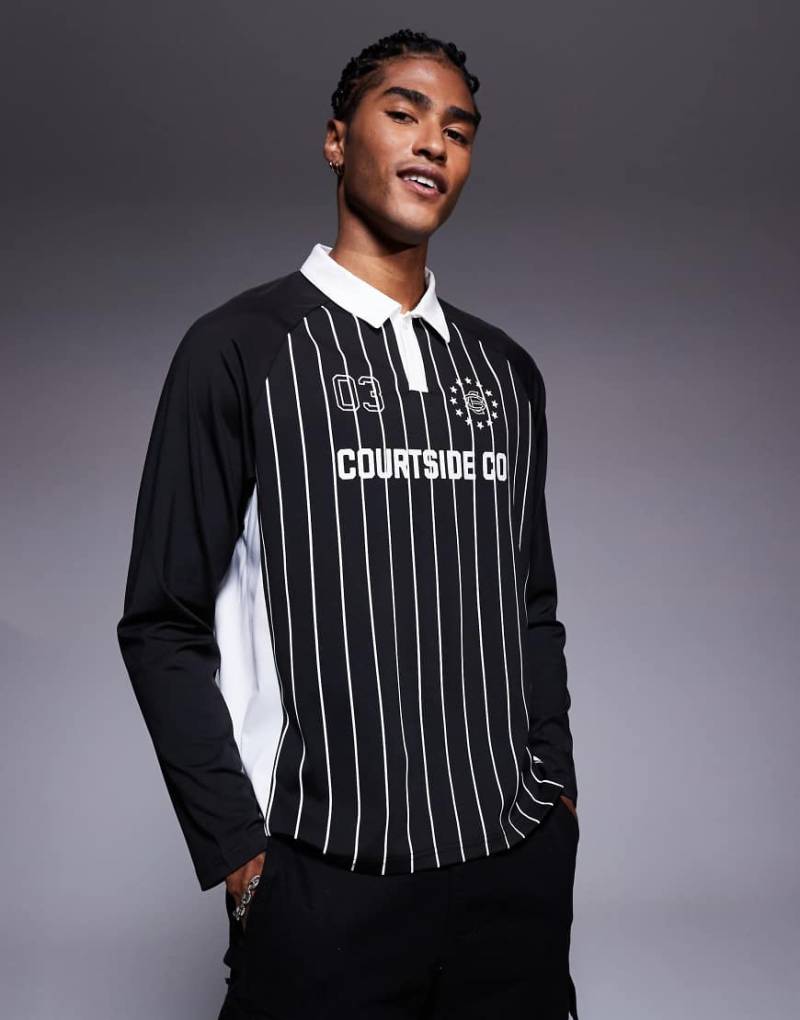 Courtside - Langärmliges Sport-Oberteil in Schwarz mit Logodetail und Bahnendesign von Courtside