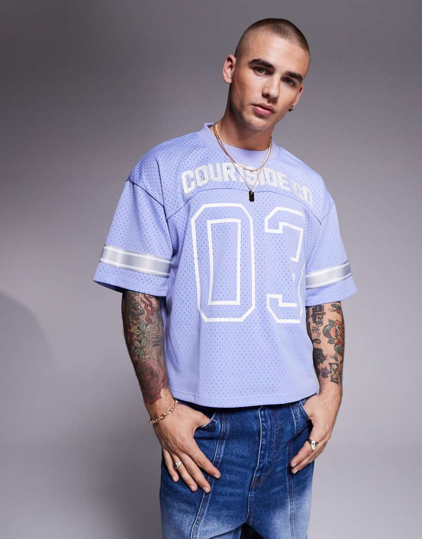 Courtside - Sport-Oberteil in Blau mit kontrastierenden Streifen von Courtside