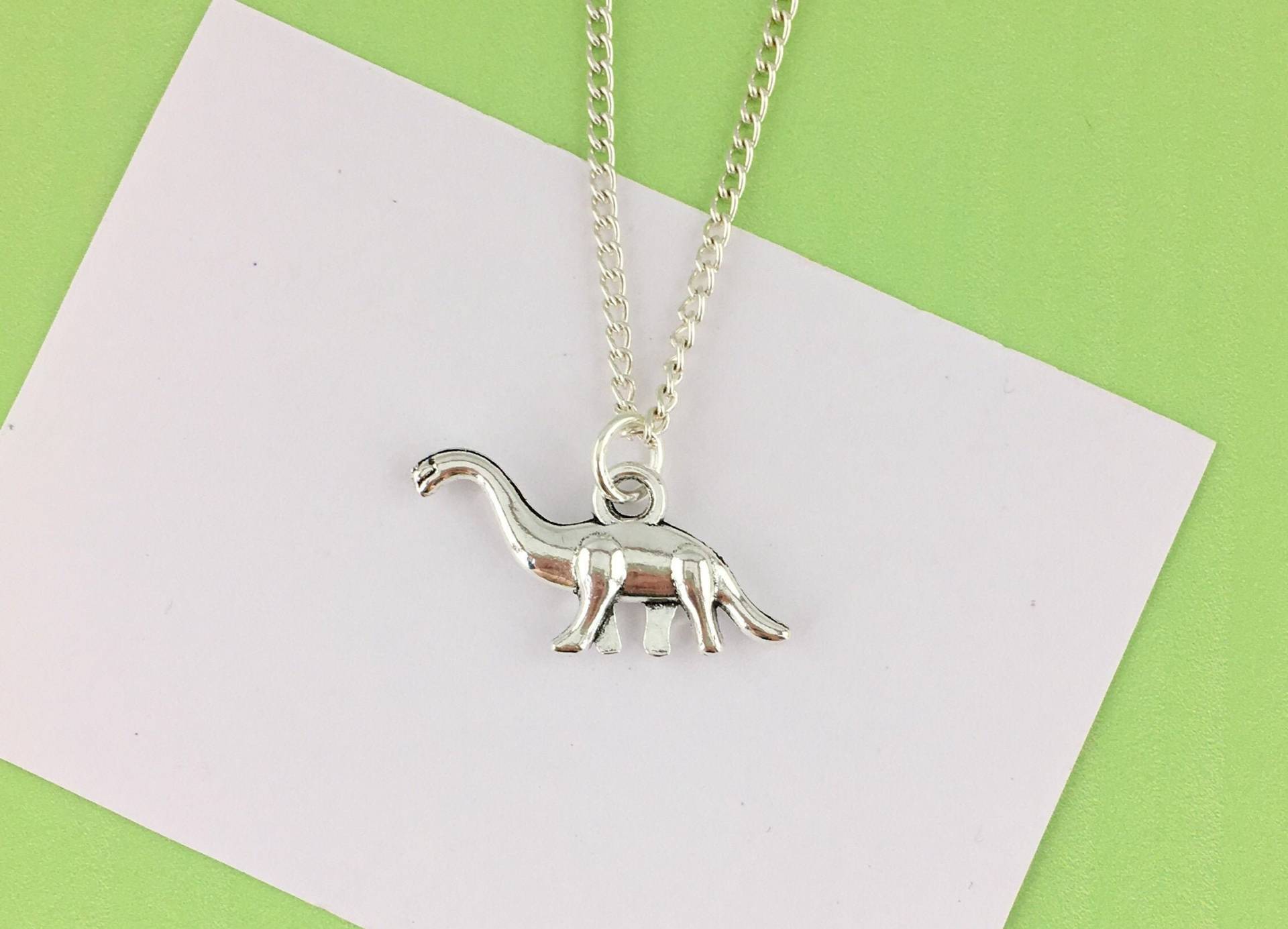 Brontosaurus Halskette, Dinosaurier Schmuck, Liebhaber Geschenk Accessoire Archäologe von CraftchemyGiftShop