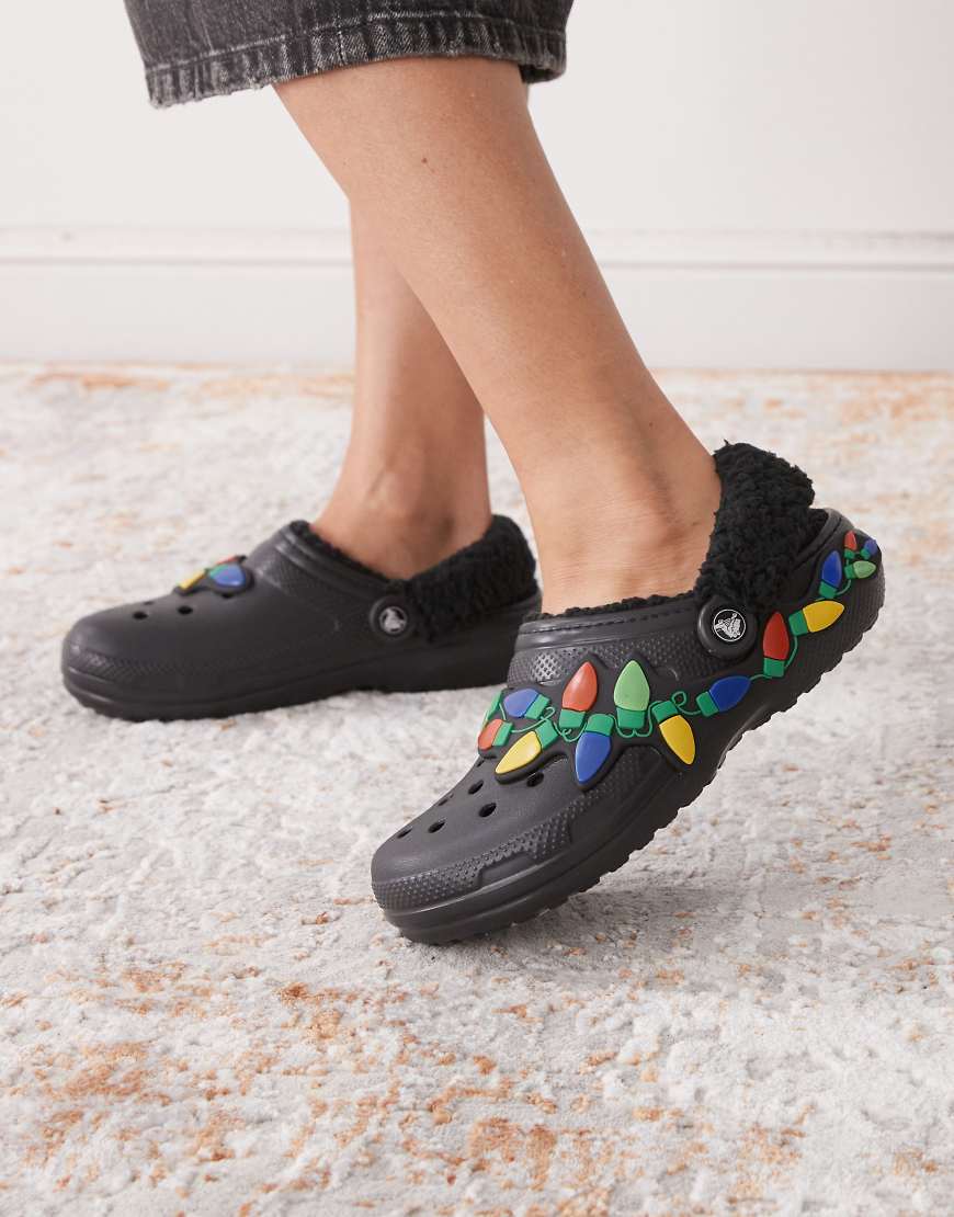 Crocs - Classic - Clogs in Schwarz mit Fleece-Futter und Lichter-Detail, unisex von Crocs