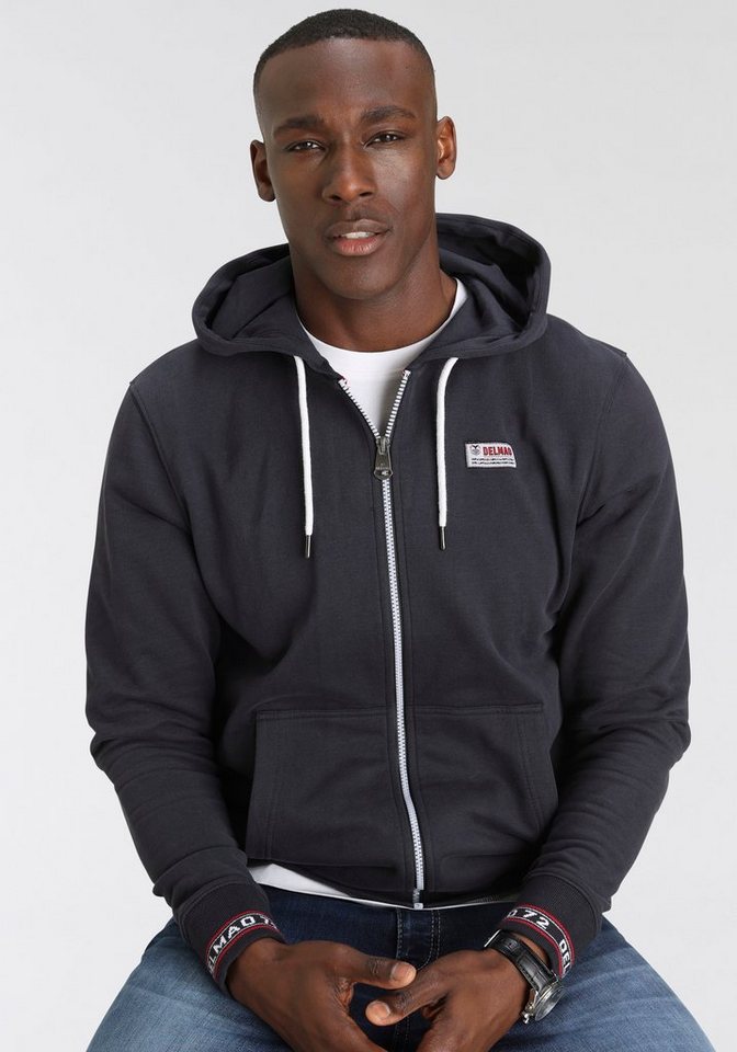 DELMAO Kapuzensweatjacke mit kontrastfarbenen Reißverschlüssen DELMAO Kapuzensweatjacke mit kontrastfarbenen Reißverschlüssen von DELMAO