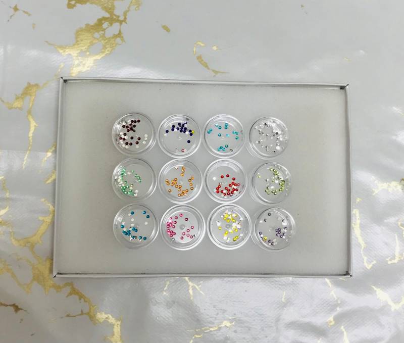 Zahn Edelstein Birthstones 12 Pack Echte Swarovski-Kristalle Farbe Monate Edelsteine Rubin Smaragd Saphir Diamant Zirkon Citrite von DENTIXSOLUTIONS
