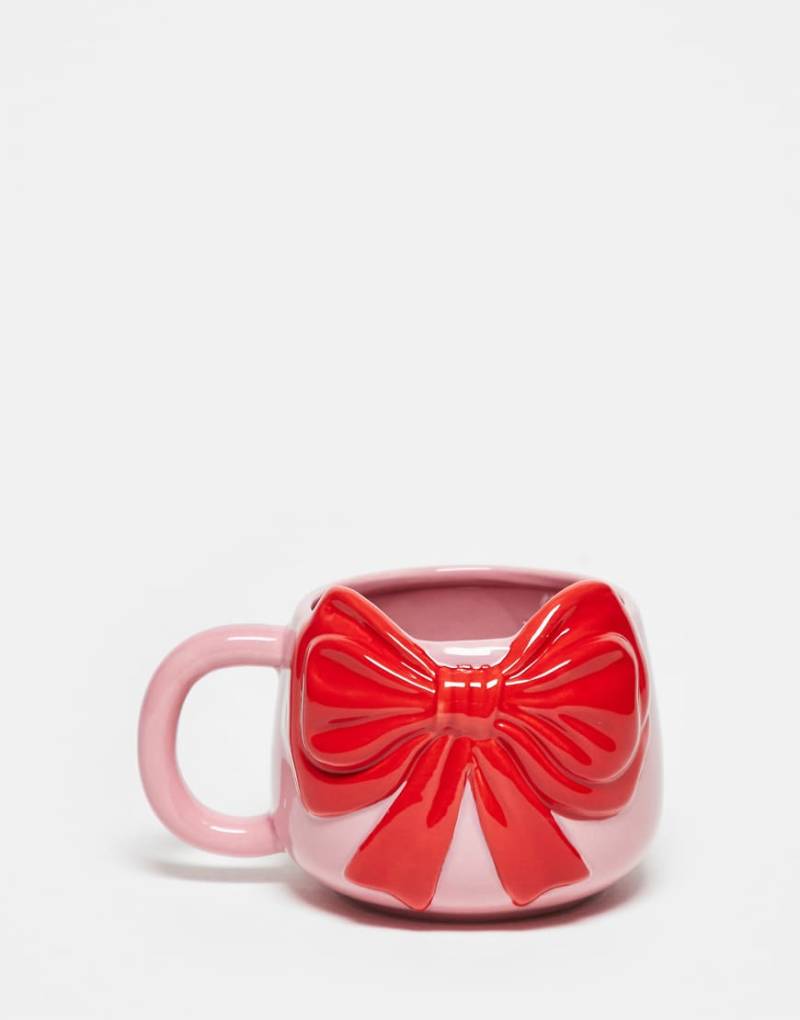 Daisy Street - Becher in Rosa mit roter Schleife von Daisy Street