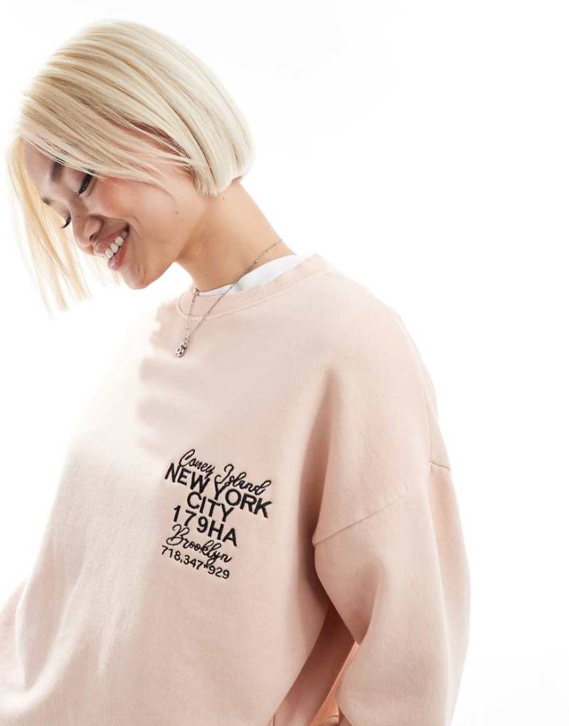Daisy Street - Oversize-Sweatshirt in verwaschenem Pfirsich mit Grafik-Rosa von Daisy Street