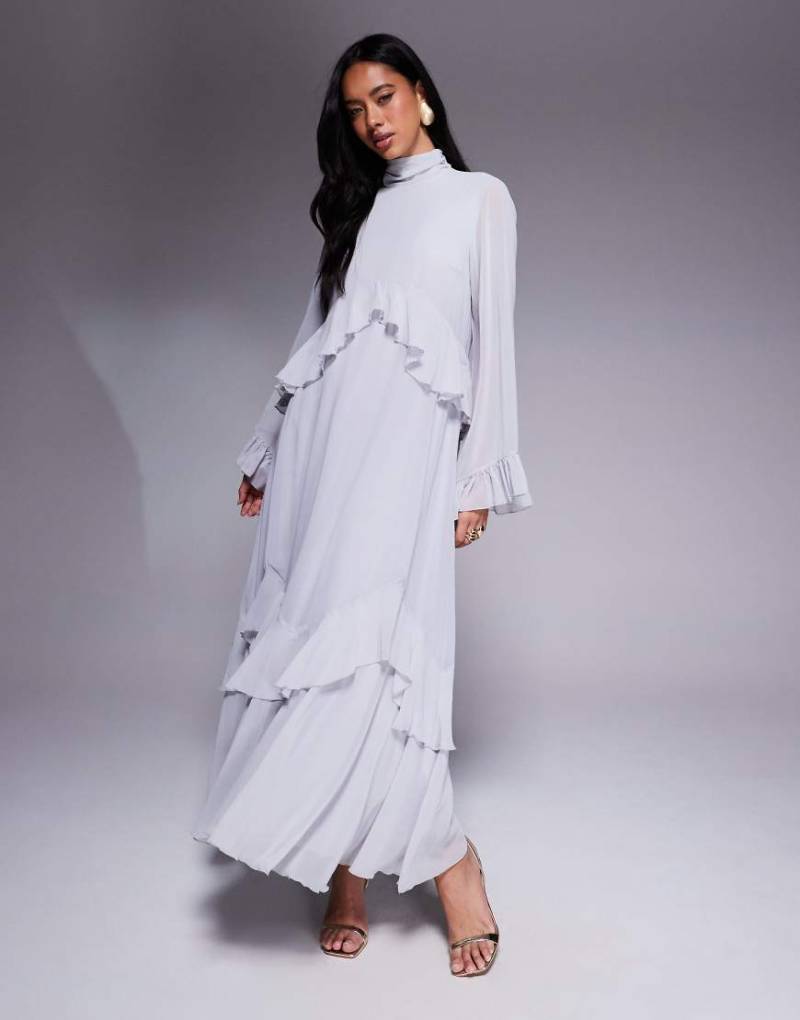 Daska - Hochgeschlossenes, mehrlagiges Maxikleid in zartem Blau mit Rüschen von Daska