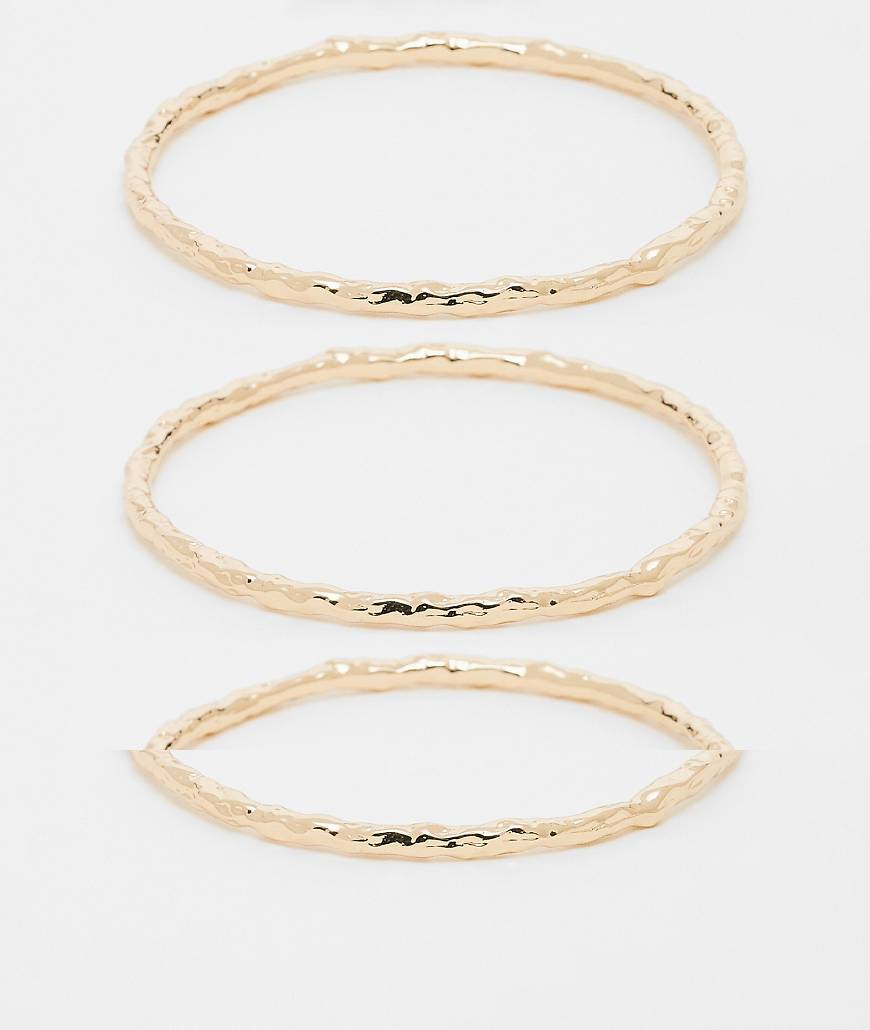 DesignB London - 3er-Pack Armreife in geschmolzener Goldoptik-Goldfarben von DesignB London