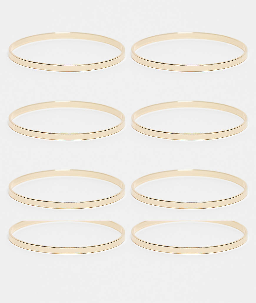 DesignB London - 8er-Pack Armreife in Gold-Goldfarben DesignB London - 8er-Pack Armreife in Gold-Goldfarben von DesignB London