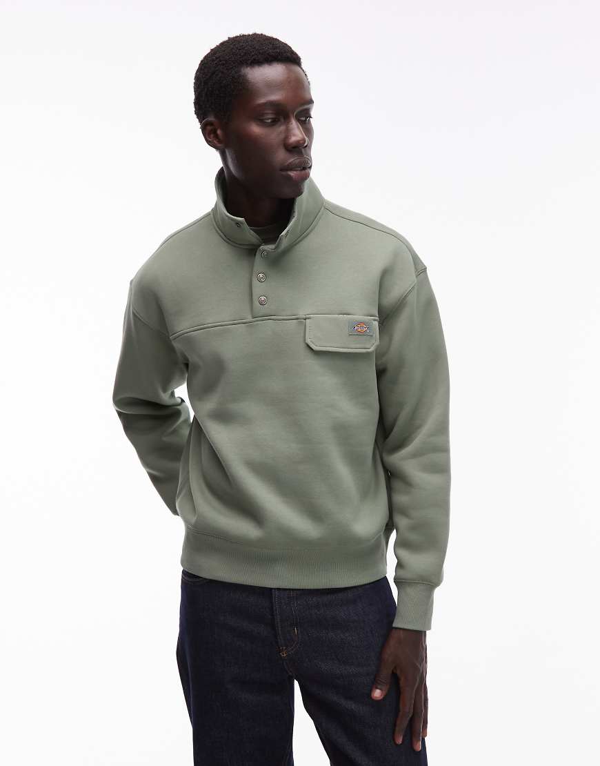 Dickies - APAC - Pullover in Hellgrün mit kurzer Knopfleiste Dickies - APAC - Pullover in Hellgrün mit kurzer Knopfleiste von Dickies