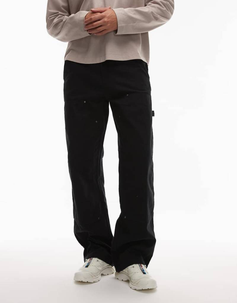 Dickies - Carpenter-Hose in Schwarz mit verstärkter Kniepartie aus Canvas Dickies - Carpenter-Hose in Schwarz mit verstärkter Kniepartie aus Canvas von Dickies