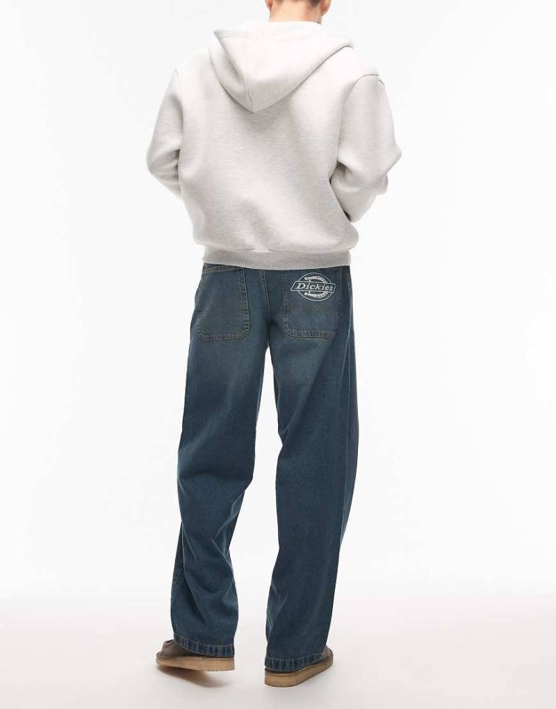 Dickies - Hilham - Weite Jean in Blau mit Khaki-Grünstich und Logo auf der Tasche von Dickies