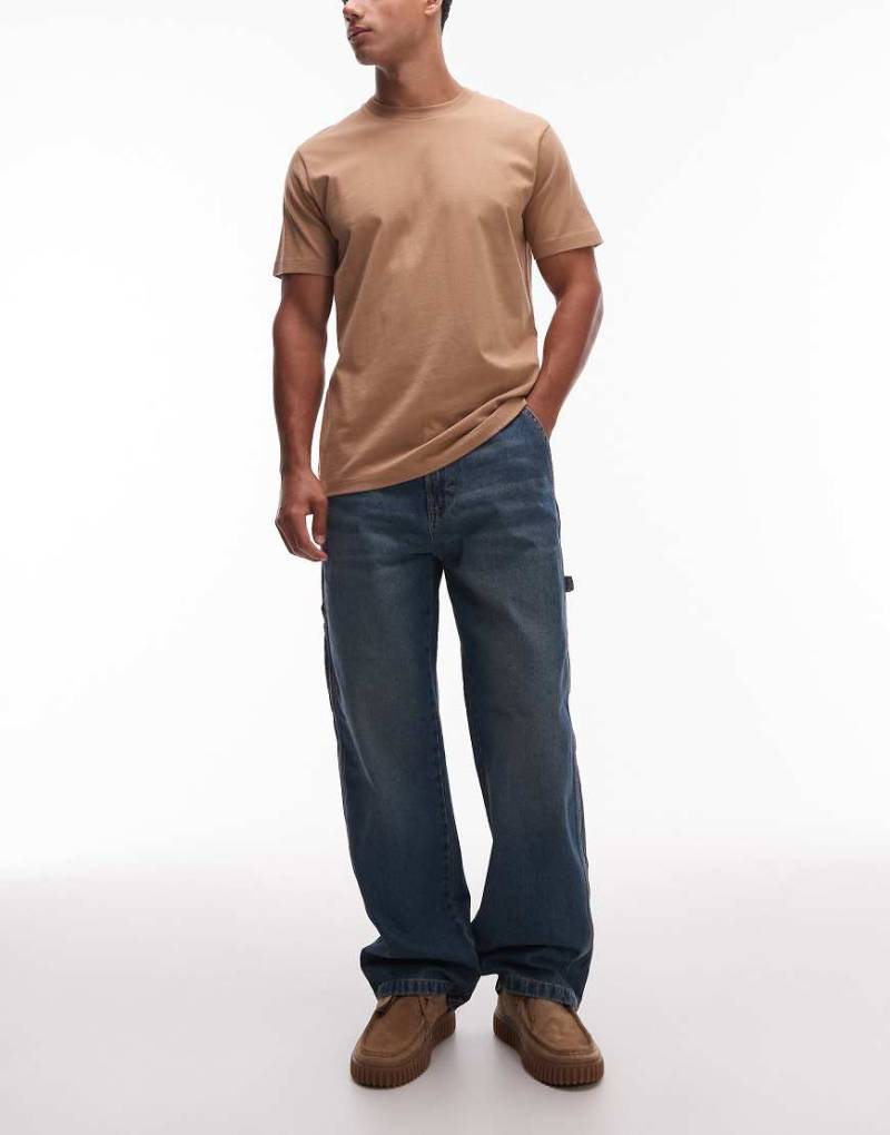 Dickies - Stevensville - Weite Carpenter-Jeans in Blau mit Khaki-Tönung-Grün von Dickies