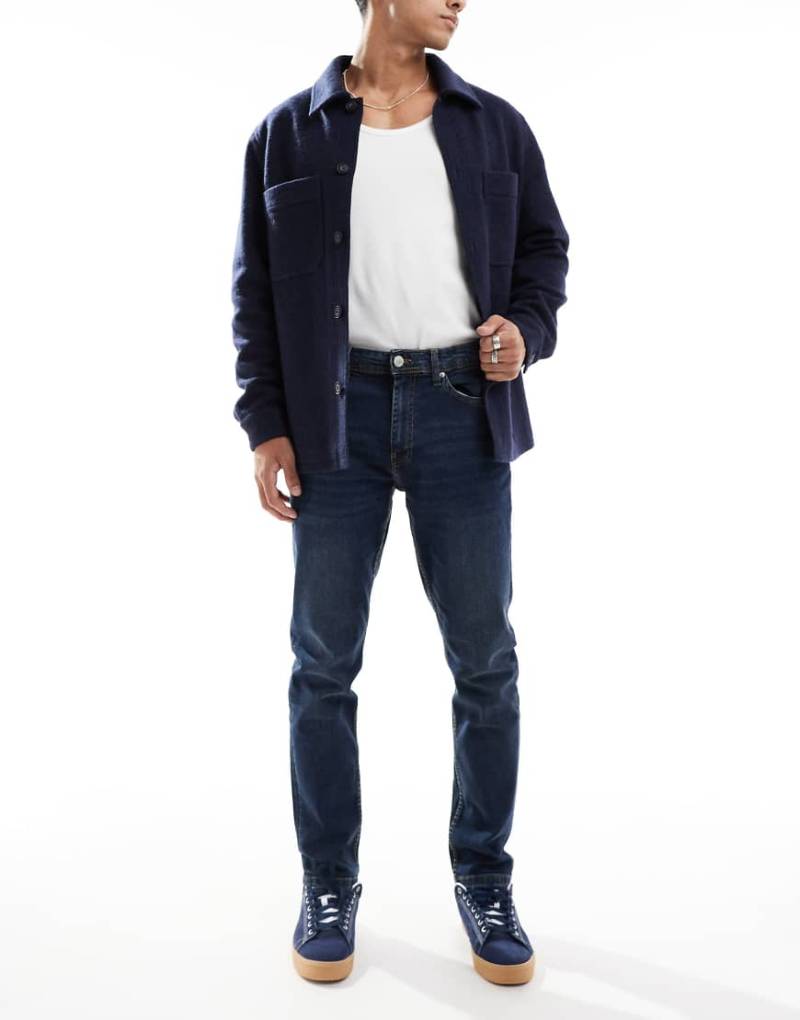 DTT - Schmal geschnittene Stretch-Jeans in Dunkelblau-Marineblau von Don't Think Twice