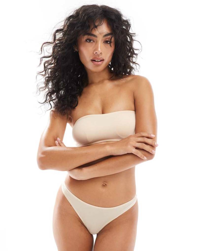 Dorina - Essential - Mix & Match - String-Tanga in Beige mit hohem Beinausschnitt und abfallendem Design vorne-Neutral von Dorina