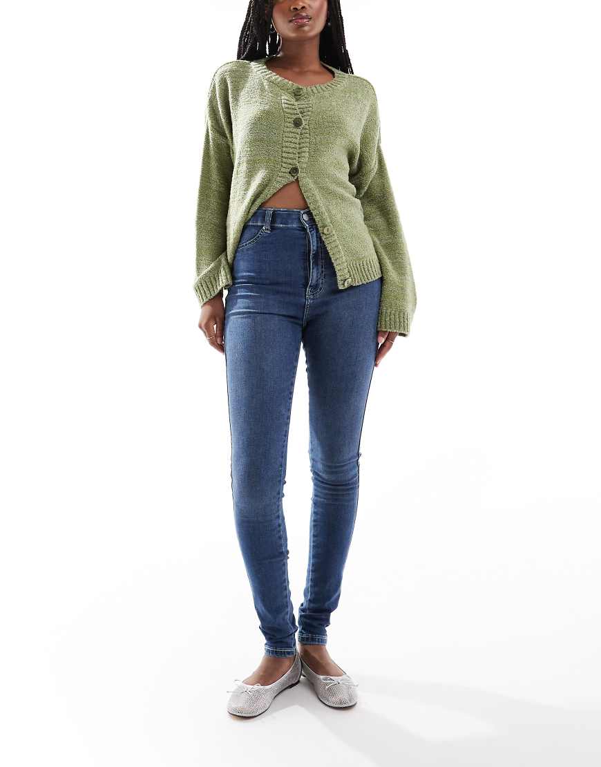 Dr Denim - Solitaire - Superenge Skinny-Jeans in mittelblauer Used-Beck-Waschung mit hohem Bund von Dr Denim