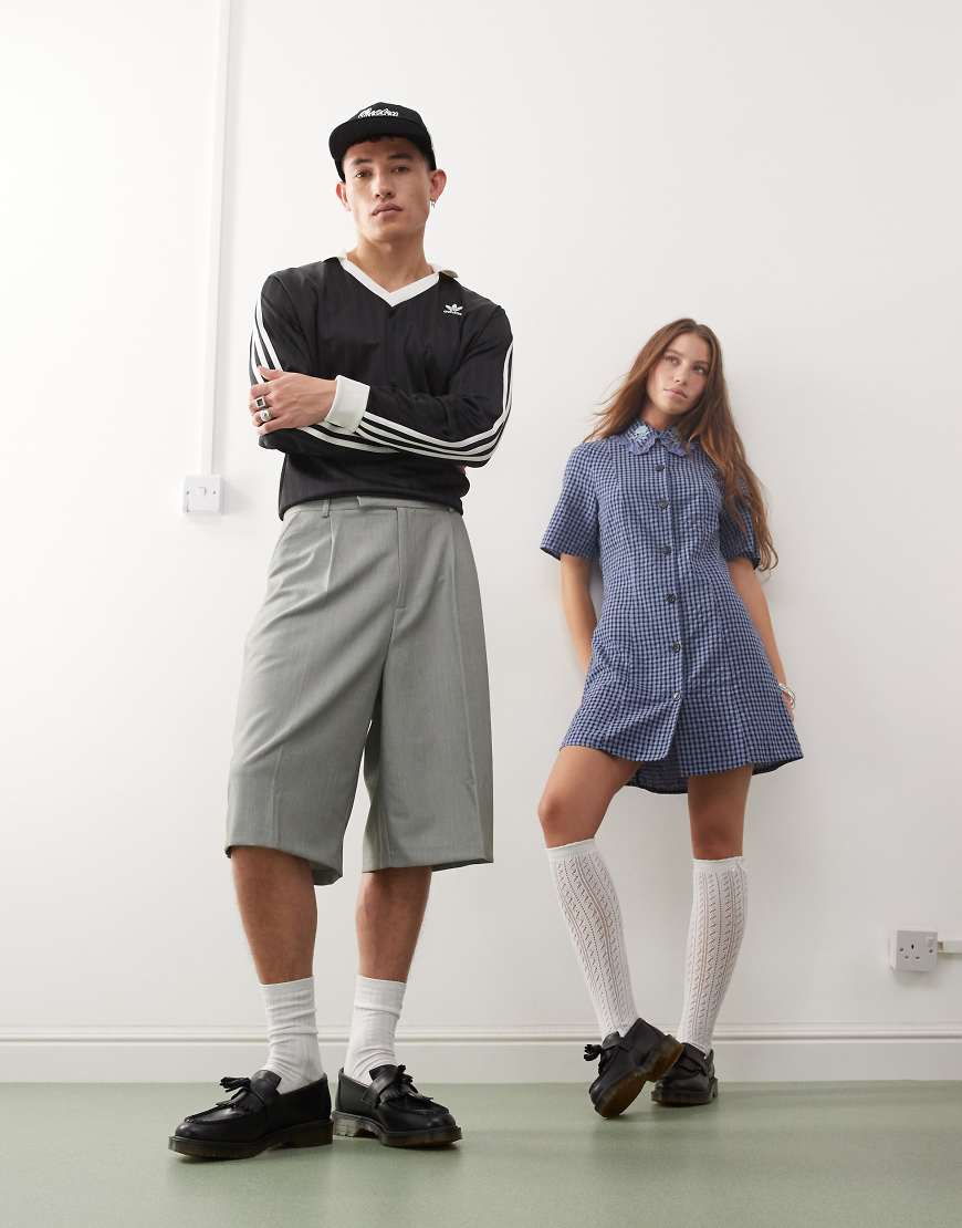 Dr. Martens - Adrian - Unisex-Loafer aus poliertem Glattleder in Schwarz mit Quastendetail Dr. Martens - Adrian - Unisex-Loafer aus poliertem Glattleder in Schwarz mit Quastendetail von Dr Martens