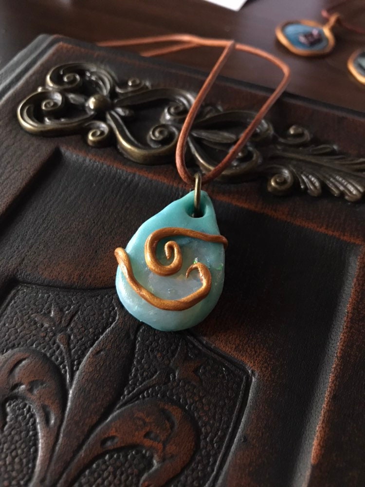 Glow in The Dark Gold Swirl Halskette Glow in The Dark Gold Swirl Halskette von DragonMagicReborn