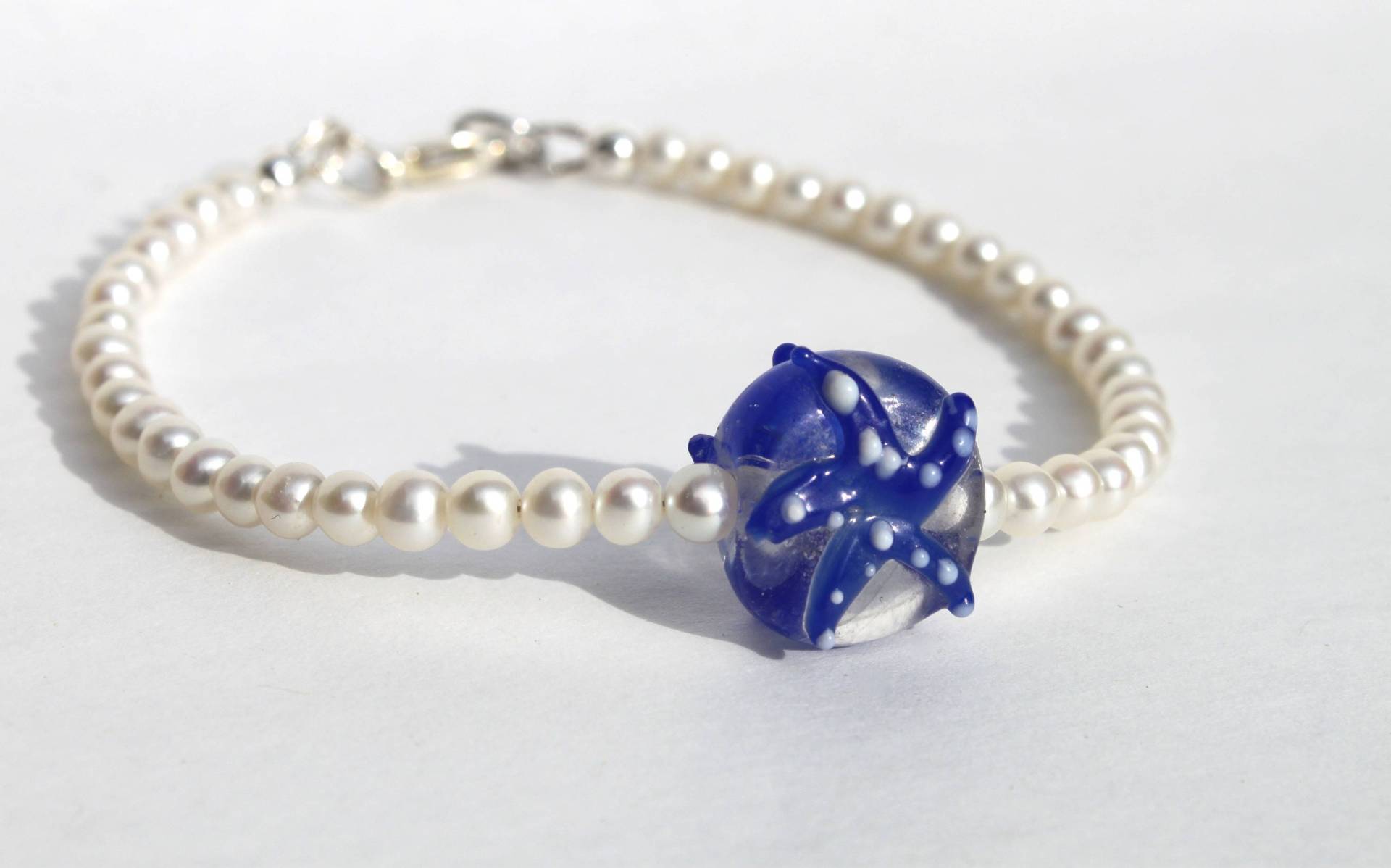 Perle Seestern Armband Mit Silberverschluss Perle Seestern Armband Mit Silberverschluss von DreamingMuseDesigns