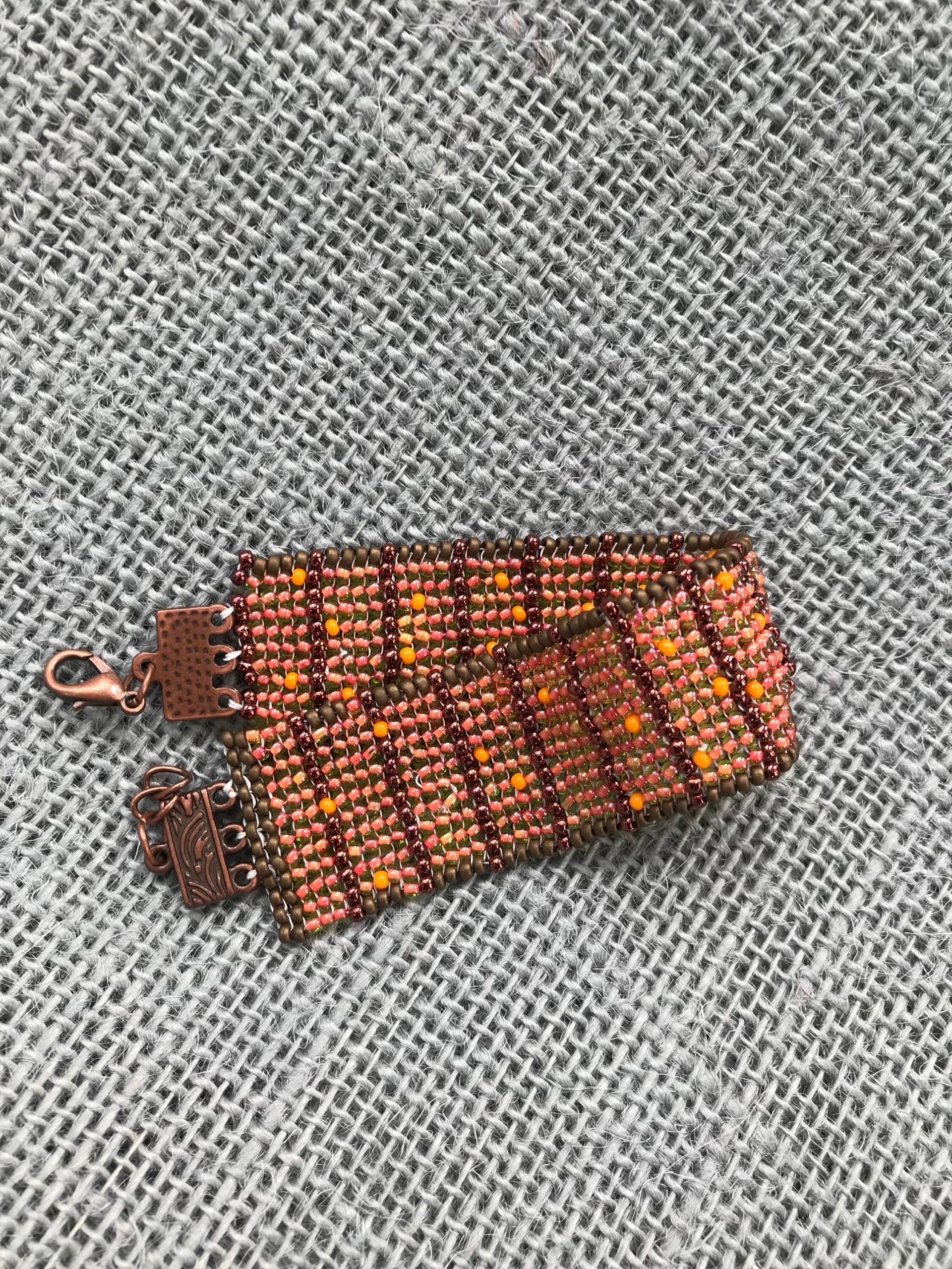 Perlen Armband in Orange Und Matt Bronze Mit Fischgrätstich Perlen Armband in Orange Und Matt Bronze Mit Fischgrätstich von DryaduirDesign