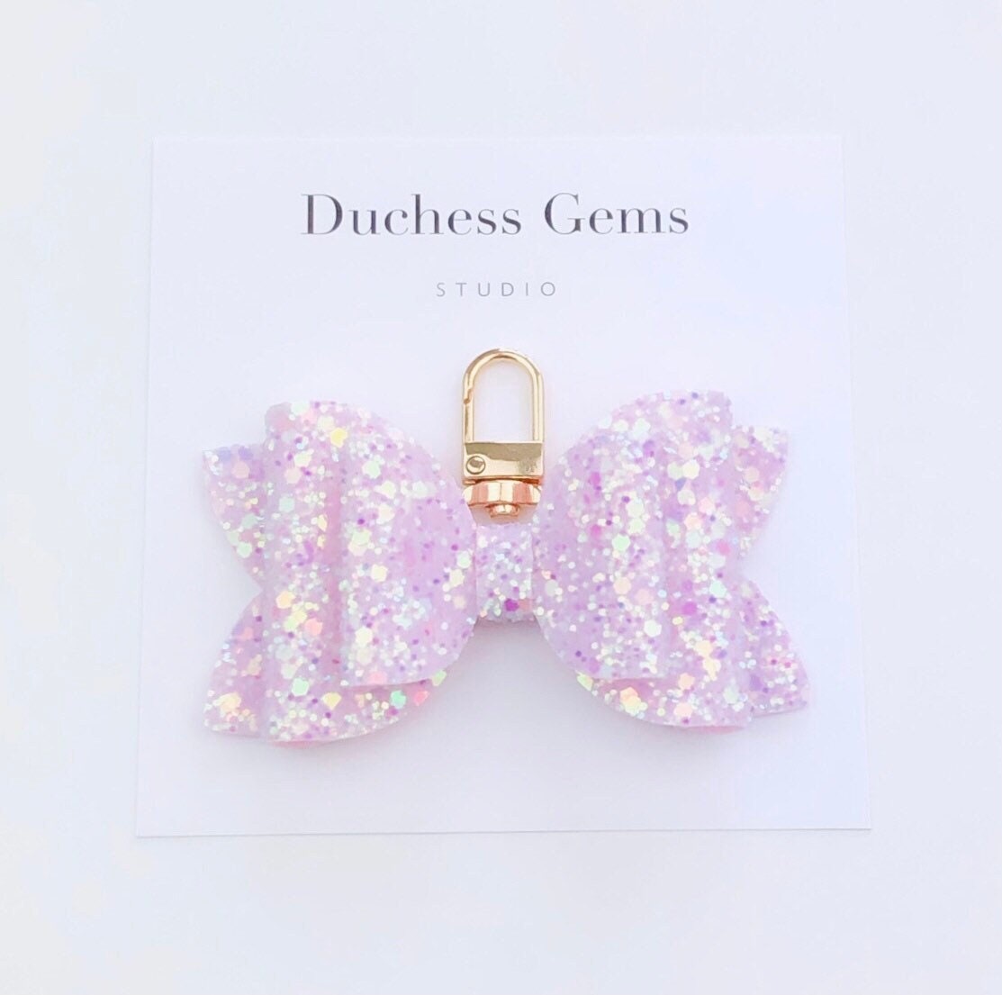Funkelnde Pink Glitzer Schleife Taschenanhänger, Changierender Wickeltasche Charm Clip von DuchessGemsStudio