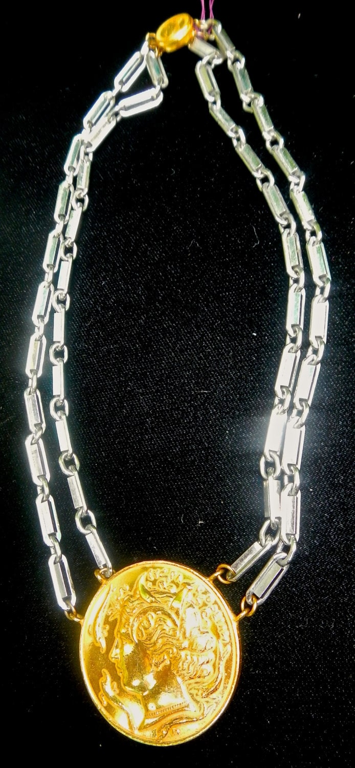 Eine Miriam Haskell Münzkette in Silberkette Und Gold Filled Münzen Um 1960 Eine Miriam Haskell Münzkette in Silberkette Und Gold Filled Münzen Um 1960 von EOJNOLa