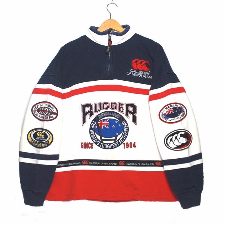 Vintage 90Er Jahre Canterbury Von Neuseeland Voller Stickerei Logo Halb Zip Sweatshirt von ElsewhereVintageShop
