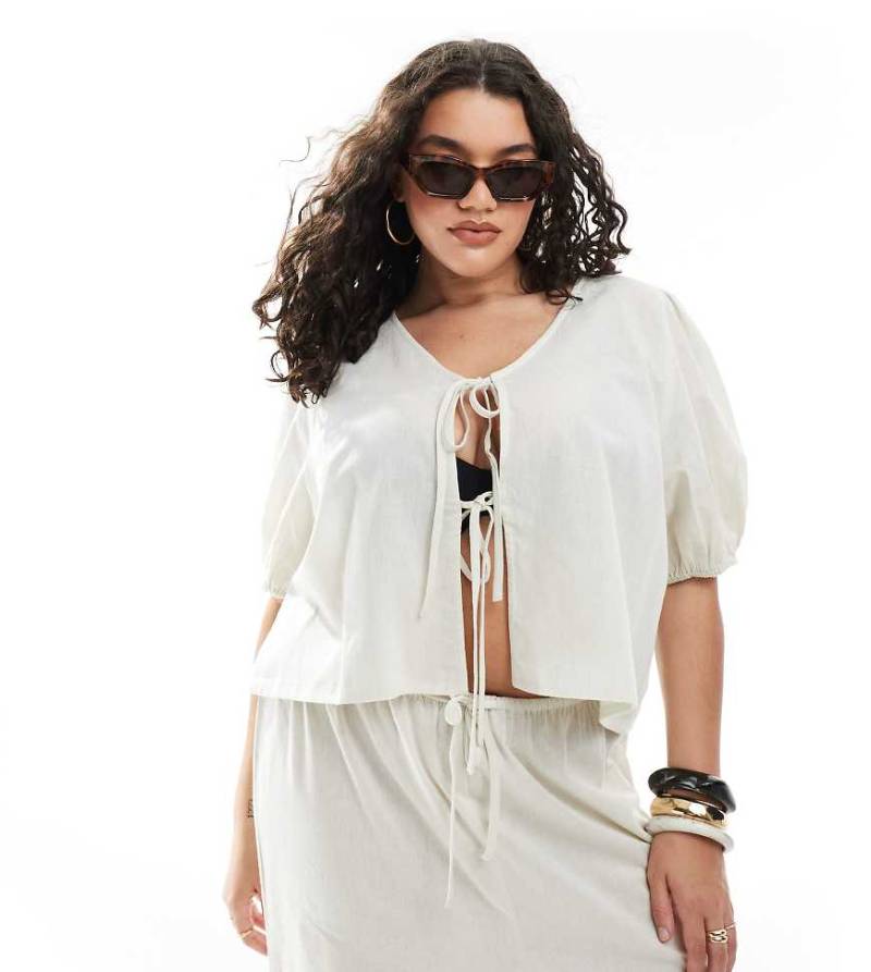 Esmée Curve - Exklusives, vorne gebundenes Strandoberteil in Hellbeige mit Puffärmeln-Neutral von Esmee Curve