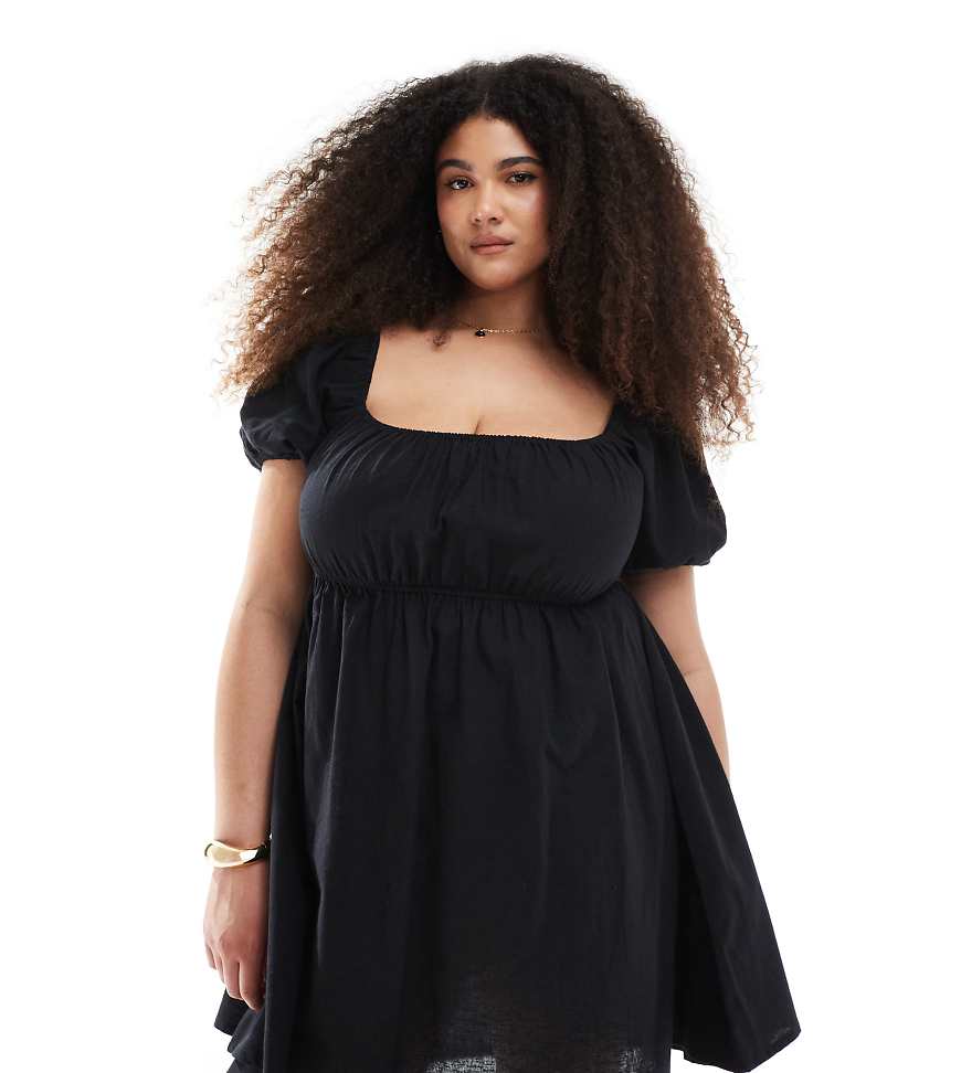 Esmée Curve - Exklusives Strand-Minikleid in Schwarz mit Puffärmeln und Bindedetail vorne von Esmee Curve